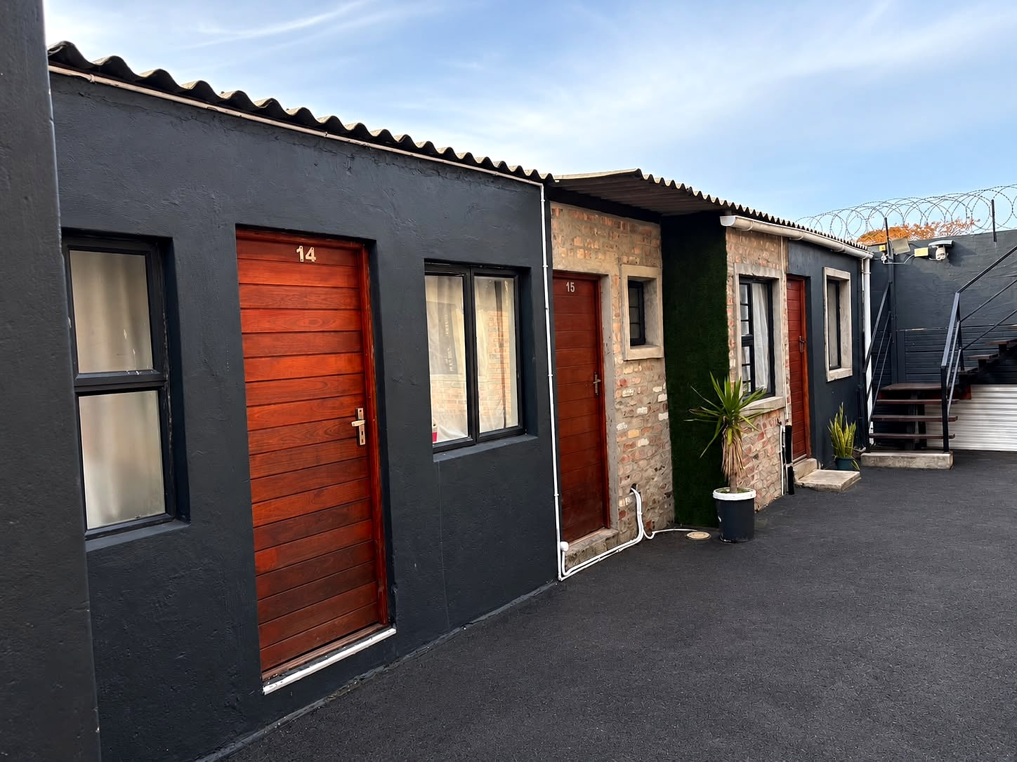 Rooms 14 and 15 on the paved yard at 12B Durham Street